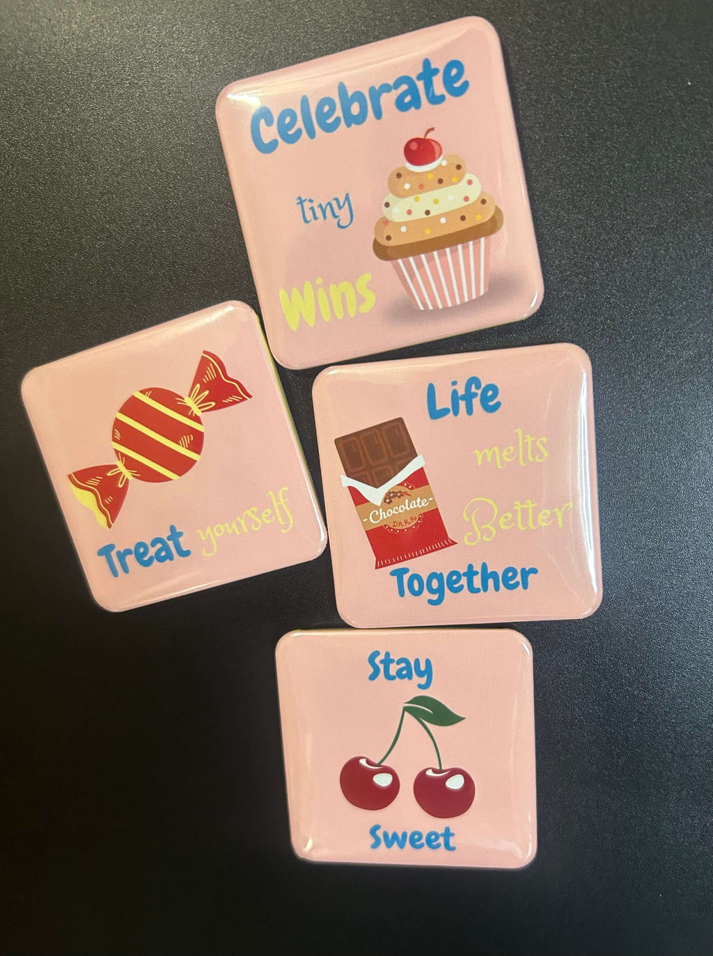 Sweet Bites Mini Magnets Set displayed on a fridge with uplifting quotes