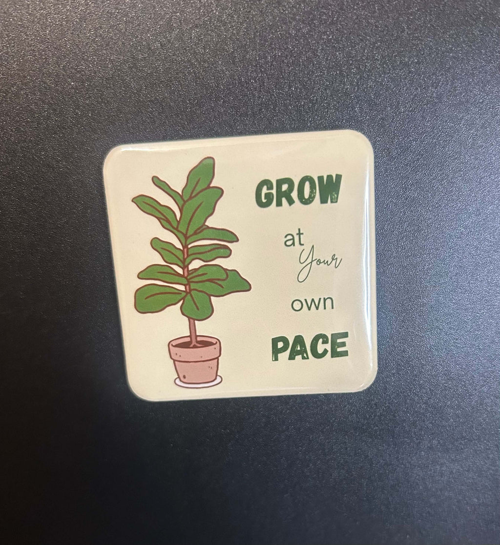 Garden Cuties Mini Magnets Set displayed on a fridge with colorful, nature-inspired decorations