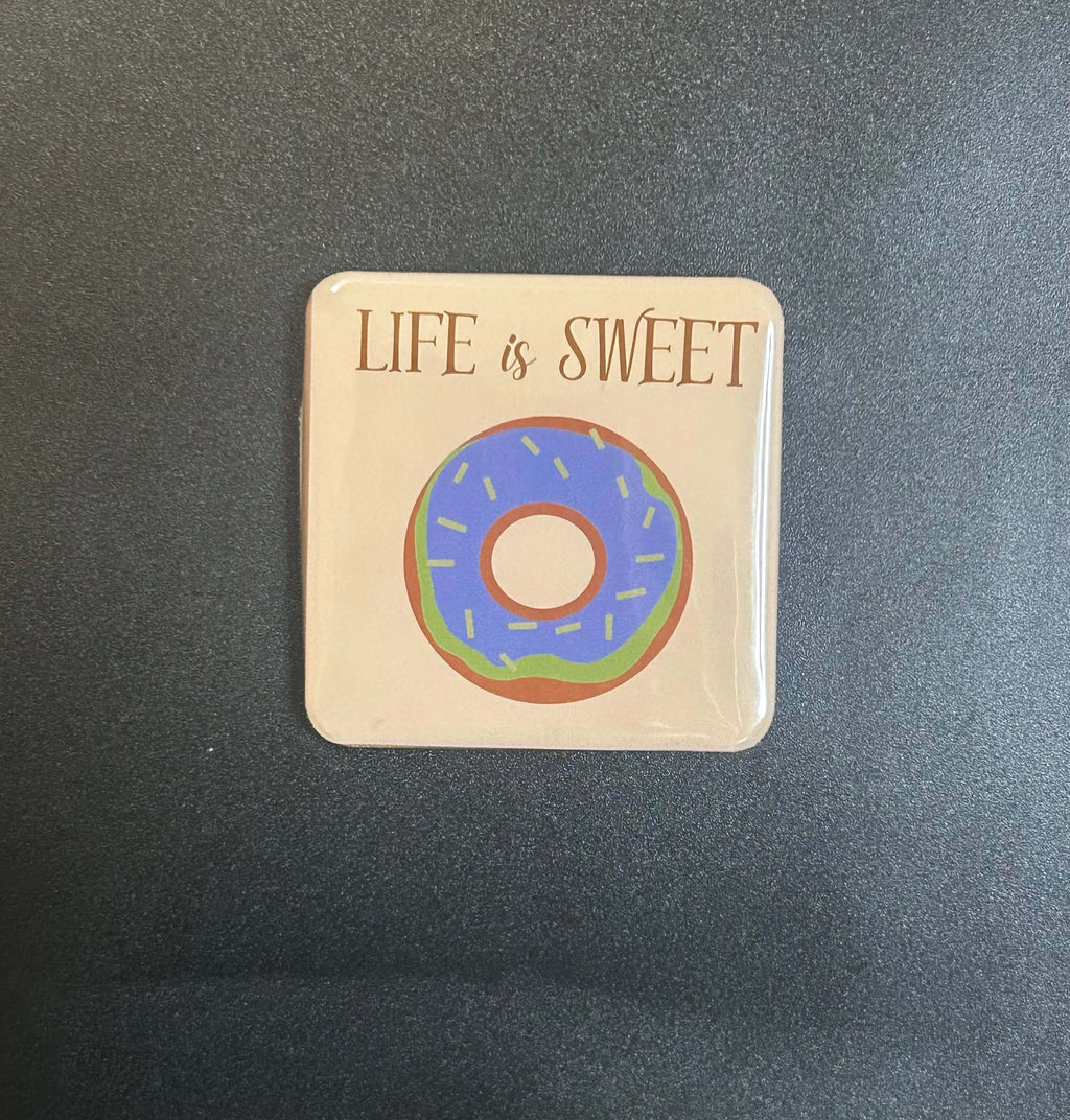 Cozy Crew Mini Magnets Set displayed on a fridge with cheerful, cozy illustrations