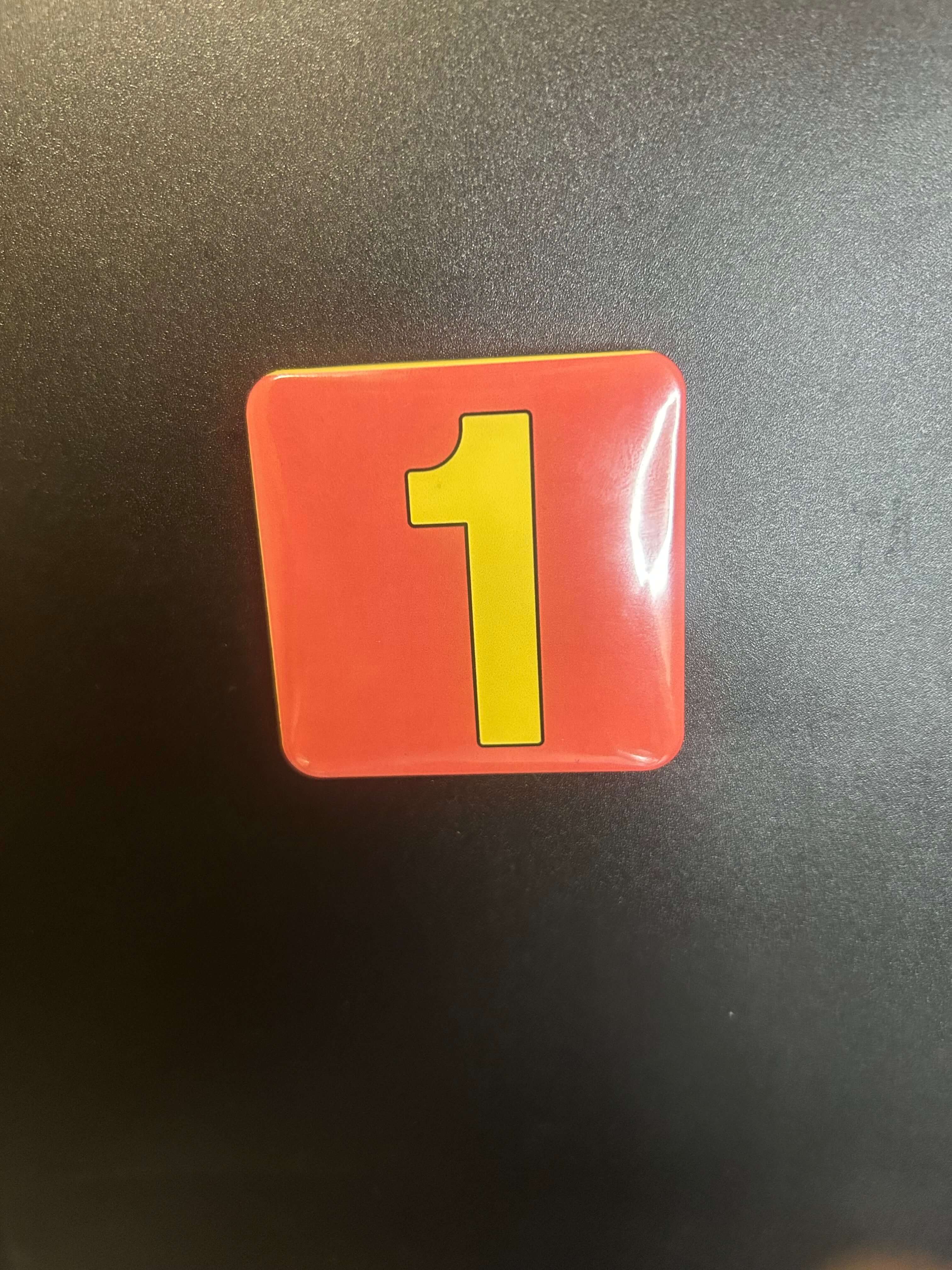 Math Essentials Magnet Set on fridge showing numbers and symbols